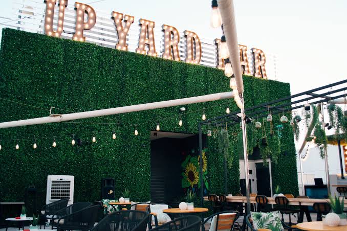 Upyard Lounge interior with red seating